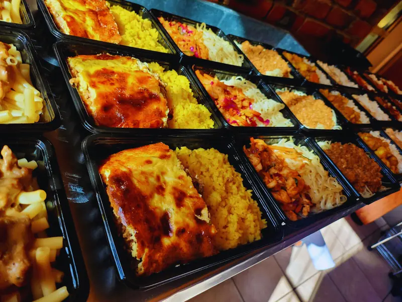 Trays of home-style dinners including lasagne, pasta and vegetables